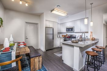 Furnished kitchen with stainless steel appliances